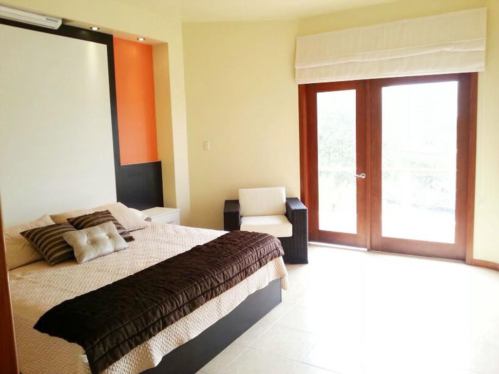 Hotel La Laguna Galapagos بْوُرتو فيلاميل الغرفة الصورة